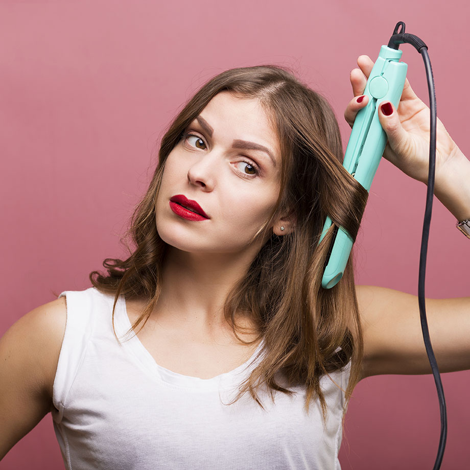 woman curling hair