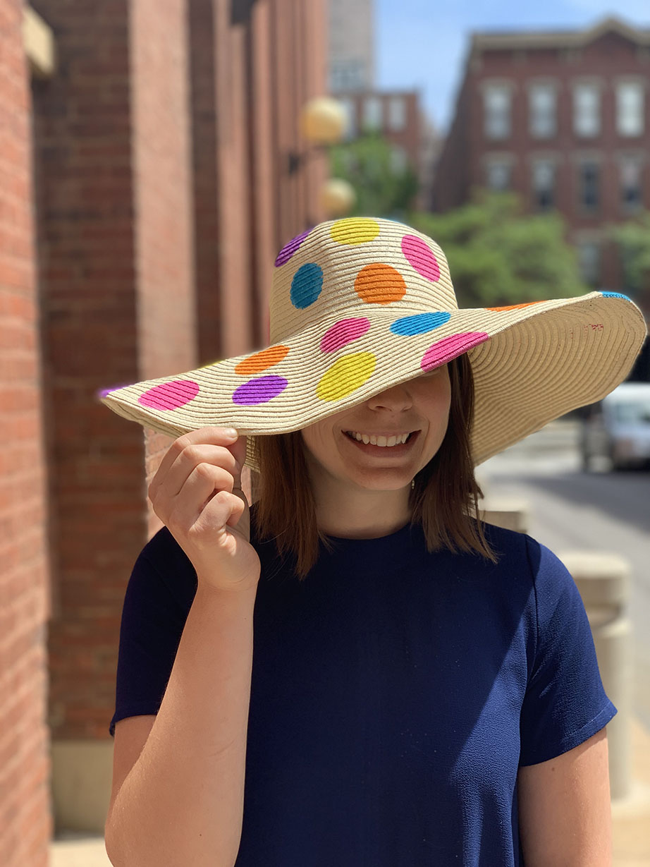 woman wearing floppy hat