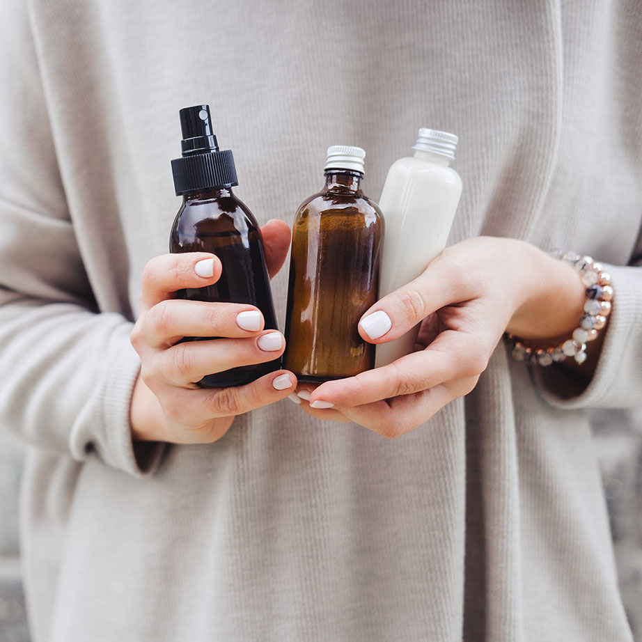 woman holding bottles