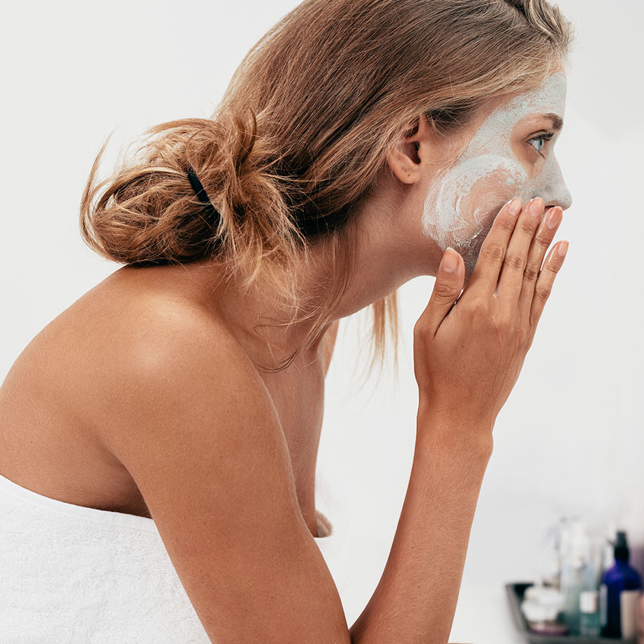 woman washing face